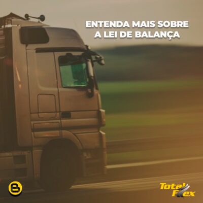 a imagem mostra um caminhão na estrada, somente a sua cabine ao lado esquerdo